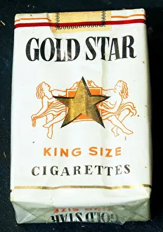 Regulations Prints: The Gold Star cigarette package features a simple design with a clear brand name