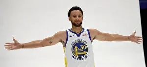 Photo Shoot Prints: Golden State Warriors guard Stephen Curry displays his wingspan during a photo shoot