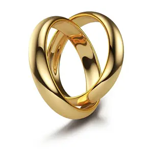 Honeymoon Prints: golden wedding ring isolated on a white background. 3d rendering