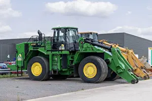 Mover Prints: Gondreville, France - View on a green wheel loader CAT 988H for earthworks on a construction site