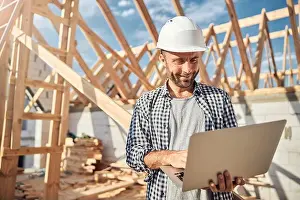 Contractor Prints: Good-looking man in charge of construction management