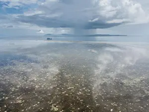 A gorgeous coral reef surrounds the remote island of Koon in the Banda Sea of Indonesia. This tropical region is known for its marine biodiversity
