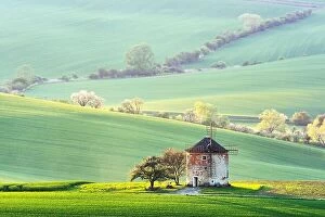 Images Dated 22nd April 2019: Gorgeous rural landscape with old windmill and green sunny spring hills