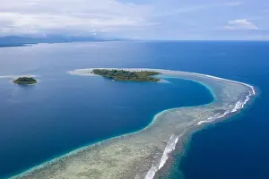 New Ireland Prints: A gorgeous, tropical island is surrounded by reef in Papua New Guinea