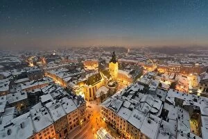 Images Dated 5th January 2019: Gorgeus cityscape of winter Lviv city from top of town hall during sunset, Ukraine