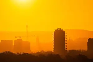 Sky Landscape Prints: Gothenburg, Sweden - March 07 2024: City silhouette on a golden sunrise morning