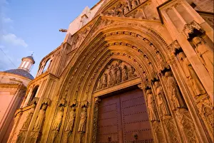 Puerto Prints: Gothic doorway Puerto de los Apostles of the cathedral in the historical city centre of Valencia Spain