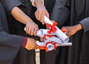 Degree Prints: Graduation, graduate celebration and hands with diploma