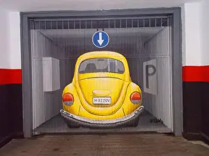 Fine Arts Prints: Graffiti of car in a garage door