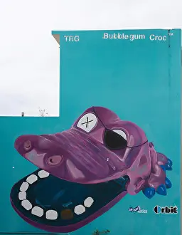 Crocodile Prints: Graffiti of wide open purple crocodile mouth