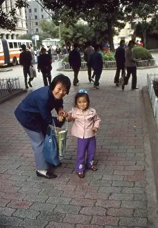 Grandma Prints: A grandmother with her grandchild in Shanghai in China