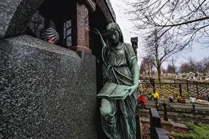 Gravestone Prints: Grave sculpture on a cemetery of Church of Virgin Mary in Broumov town in Czech Republic