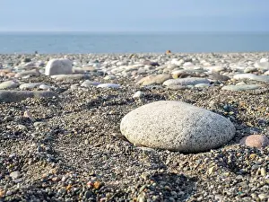 Pebble Prints: Gray sand and stones on the beach