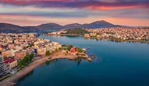 Great sunrise in Chalcis town. Stunning morning seascape of Aegean sea