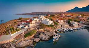 Great sunrise in Vathi port. Picturesque summer scene of Peloponnese peninsula