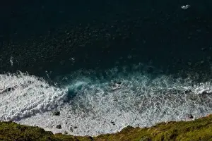 Swell Prints: Great waves in the Atlantic Ocean that are illuminated by the sun and therefore shine so beautifully