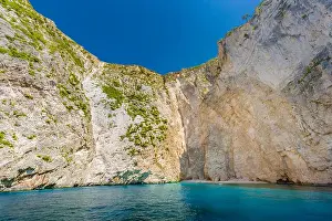 Greece, cliff landscape with sea as travel destination island with blue sky. Idyllic shoreline in Greece, Zakynthos