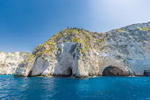 Greece, cliff landscape with sea as travel destination island with blue sky. Idyllic shoreline in Greece, Zakynthos