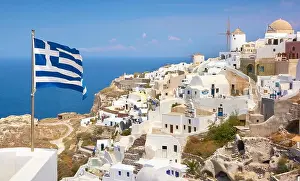 Absence Prints: Greek flag in Oia Town (northern part of the Santorini) - view from the castle