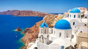 Place Of God Prints: Greek white church with blue dome overlooking the Aegean sea