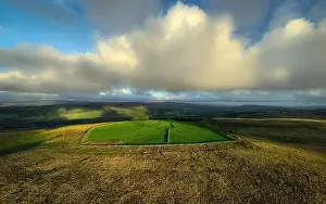 A green field light by evening light on the Gwrhyd mountain in the Brecon Beacons, South Wales UK