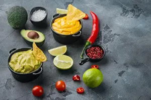 Melted Prints: Green guacamole and yellow cheese dip sauce for traditional