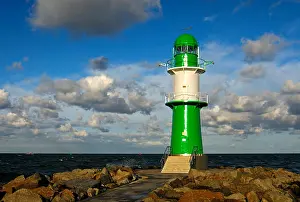 Clouded Prints: Green-white lighthouse on the Warnemuende mole