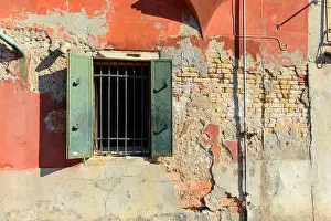 Venice Italy Prints: Green window on orange old house wall Cracks in concrete visible red bricks in Venice