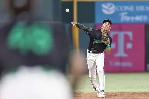 Greensboro, NC: Greensboro Grasshoppers infielder Javier Rivas (7) fields and throws out Bowling Green Hot Rods infielder Mac Horvath (19) at first ba