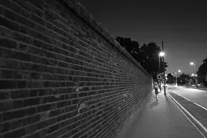 Brick Wall Prints: Greenwich Park perimeter wall at night