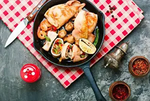 Shrimp Prints: Grilled squid stuffed with vegetables.Delicious stuffed cuttlefish