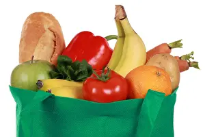 Reusable Prints: Groceries in a bag including a bread, fruits and vegetables, isolated on white