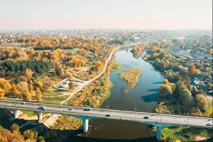 Grodno, Belarus. Aerial Bird's-eye View Of Hrodna Cityscape Skyline. Bridge Over The Neman River In Sunny Autumn Day
