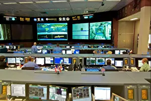 Computers Prints: Ground controllers working in the new state of the art NASA Mission Control Center at the Johnson Space Center