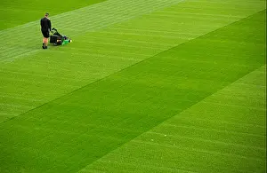 Quick Prints: A groundsman cuts the grass at Ashton Gate stadium, Bristol