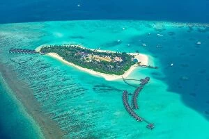 Images Dated 10th December 2015: Group of atolls and islands in Maldives from aerial view. Beautiful Maldives landscape, blue sea