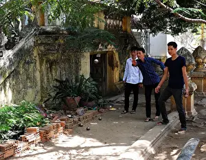 Concentrate Prints: A group of boys playing pétanque, or boules, in Siem Reap, Cambodia
