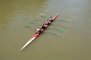 Oars Prints: A group of female rowers make their way along the river Avon in the floating harbour at Bristol