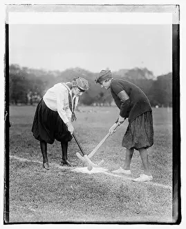 Hockey Prints: A group of girls is shown playing hockey