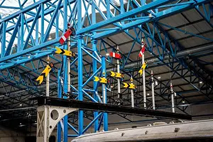 Shed Prints: A group of historic semaphore rail signals on a gantry in the UK with lower quadrant signalling