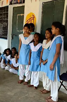 Group Of Prints: A group of Indian school girls wearing school uniform in a Government run school Madhya Pradesh India