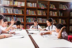 Group Indian School Students Books Studying In Library