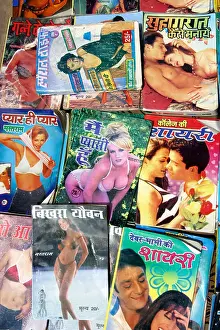 Content Prints: A group of indian sex magazines on display at a street stall in New Delhi in India