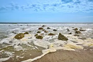 South Carolina Prints: Group of stones in the surf at Hunting Island State Park