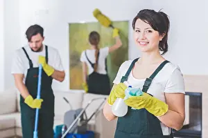 Housekeeper Prints: Group of young, hard-working professional cleaners in dirty apartment