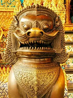 Buda Prints: Guardian statues daemon dogs on entrance of kings palace Bangkok, Thailand