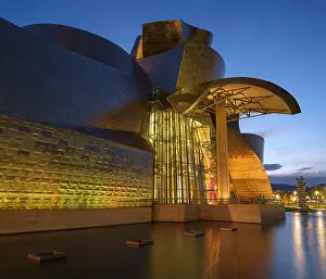 Reflecting Prints: The Guggenheim Museum at night, Bilbao, Biscay, Basque Country, Spain, Europe