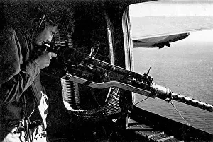 Pilot Prints: Gunne rmans his M2 Browning.50 machine gun in a WW11 USAAF Flying Fortress