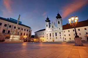 Gyor, Hungary. Cityscape image of downtown Gyor, Hungary with Szechenyi Square at sunrise