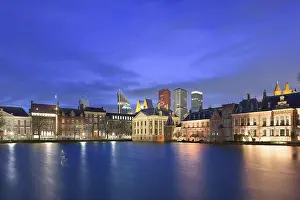 The Hague, Netherlands cityscape at twilight on Lake Hofvijver